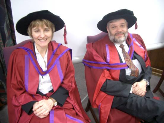 Photograph of Janet Peacock and Martin Bland in academic dress.